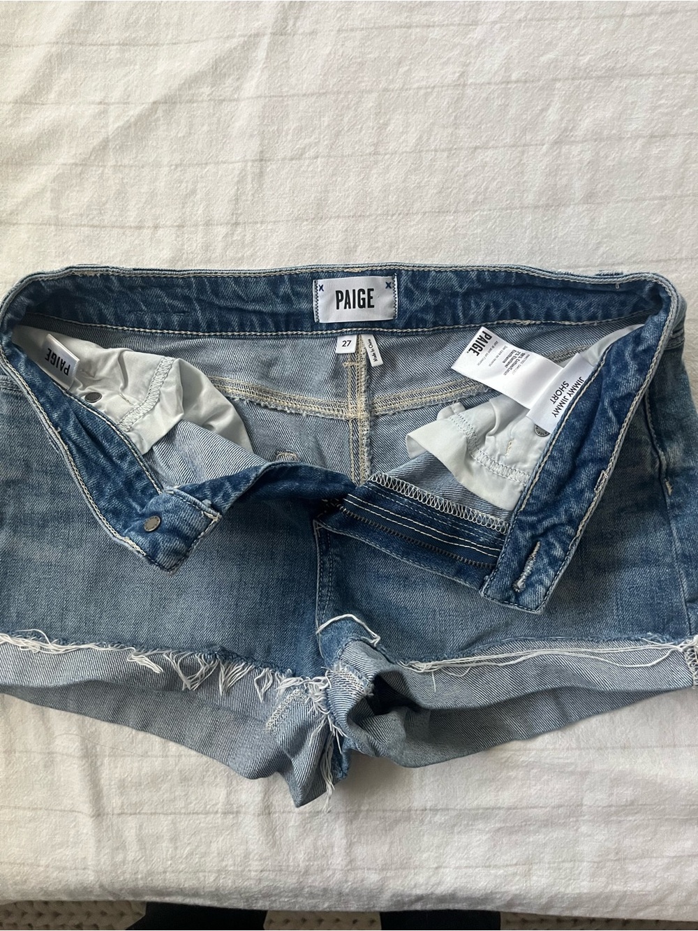 PAIGE Medium Blue Denim Short with Frayed Edge